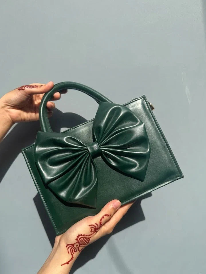 elegant-front-bow-crossbody-handbag-bottle-green-avenza-pakistan