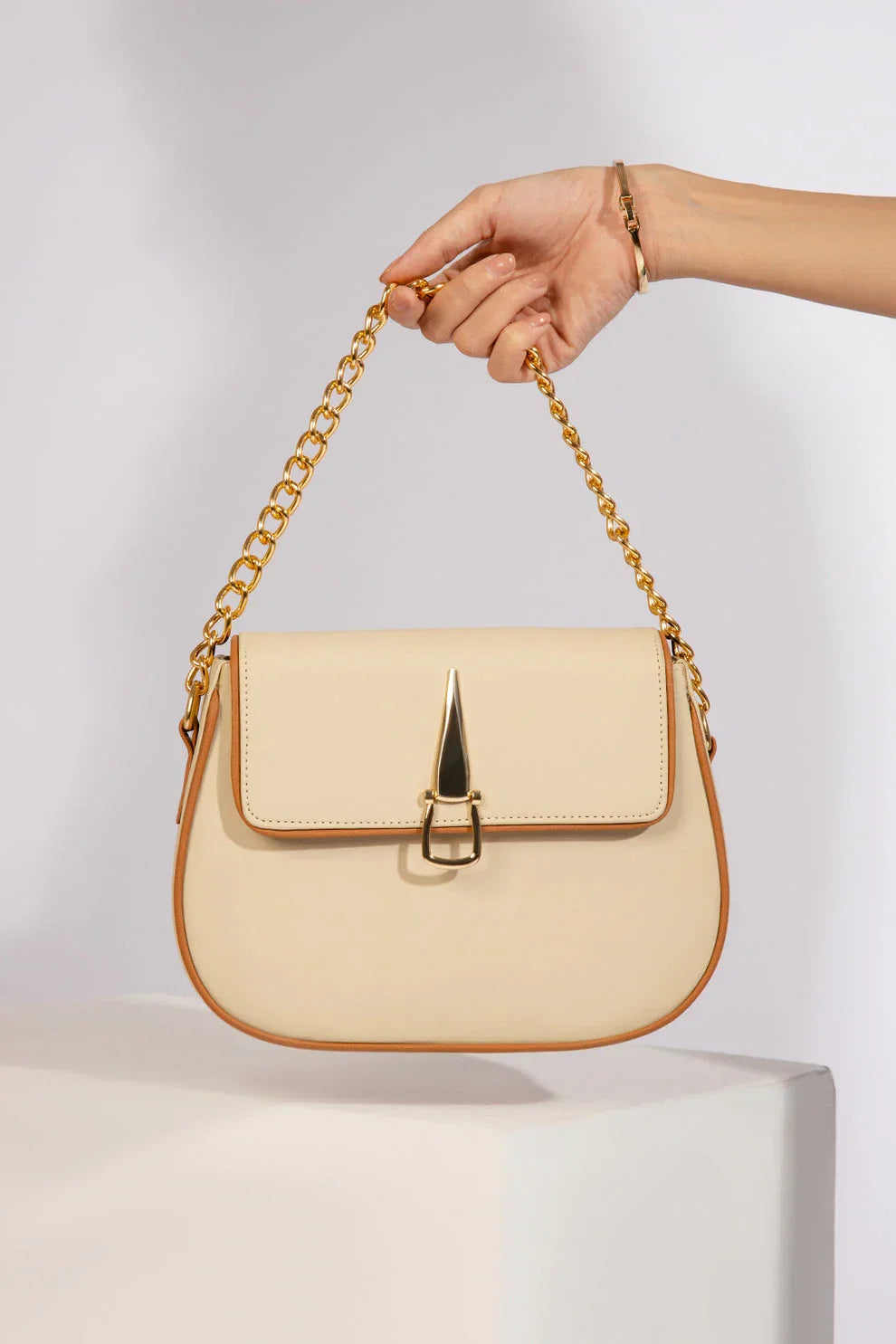 elegant-roundfit-crossbody-handbag-beige-color-avenza-pakistan