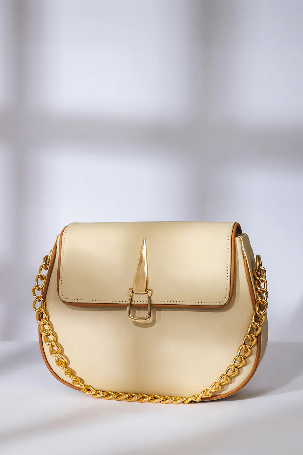 elegant-roundfit-crossbody-handbag-beige-color-avenza-pakistan